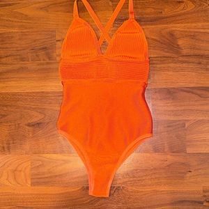 Vibrant Orange One-Piece bodysuit